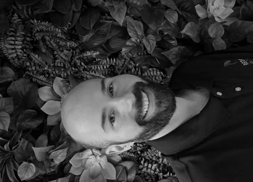 chris wells - a bald man with a beard