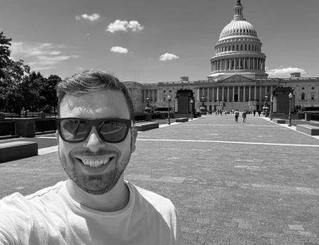Nate standing in front of the congressional building in Washington D.C.